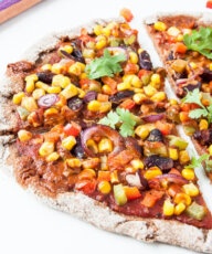 Spicy Chipotle Vegan Pizza Recipe with bell peppers, tomatoes, corn, beans and chipotle peppers - Vegan Family Recipes