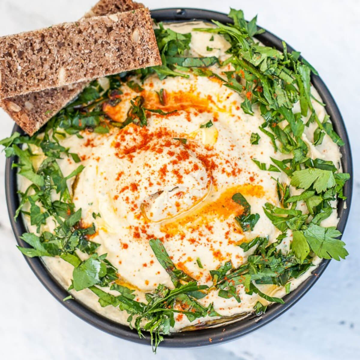 Creamy Hummus Recipe with Dijon Mustard, Tahini, and Fresh Parsley - Vegan Family Recipes #appetizer #smooth #dip