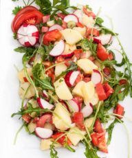 Healthy Vegetable Potato Salad Recipe w/ Bell peppers, tomatoes, radishes, arugula and more! No mayo ;) - VeganFamilyRecipes.com - #vegetables #potatoes