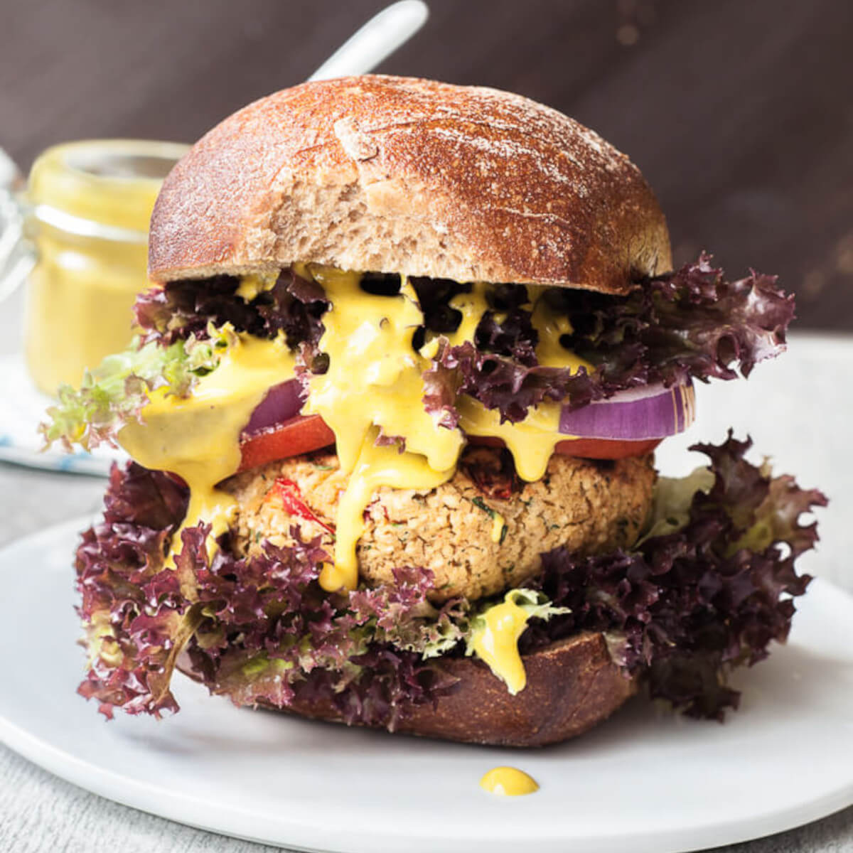 Healthy Couscous Burger Recipe with Garlic Coconut Sauce | VeganFamilyRecipes.com | #bbq #vegan #vegetarian