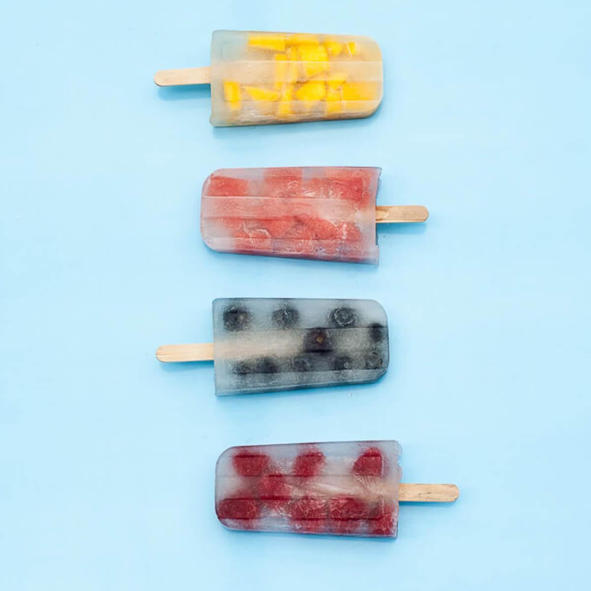 Coconut Water Popsicles or Ice Pops with fruit - Mango, Watermelon, Raspberries, and Blueberries , Vegan, Gluten-free, Sugar-free and healthy! - Vegan Family Recipes