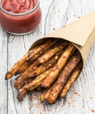 Baked Cajun Fries Recipe - Crispy, oven baked, spicy french fries! - VeganFamilyRecipes.com #healthy #potatoes #vegan