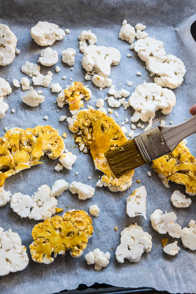 cauliflower brushed with olive oil, turmeric, garlic sauce